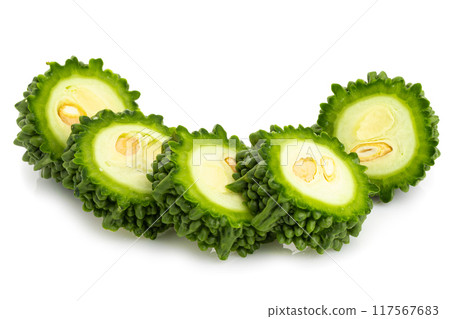 Fresh bitter gourd Bitter cucumber or bitter melon with cut slice isolated on a white background. Fresh bitter gourd Bitter cucumber or bitter melon with cut slice isolated on a white background. 117567683