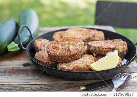 Zucchini slices fried 117569087