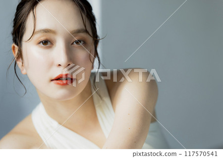 A woman in a white dress A woman in a white dress 117570541