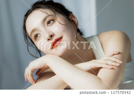 A woman in a white dress A woman in a white dress 117570542