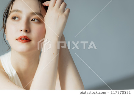 A woman in a white dress A woman in a white dress 117570551