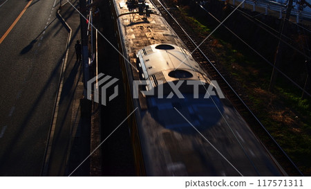 The Sanyo Main Line racing towards the setting sun The Sanyo Main Line racing towards the setting sun 117571311