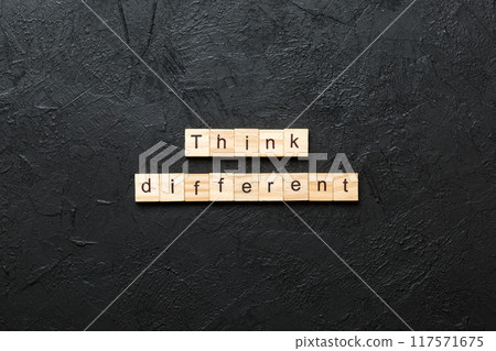 think different word written on wood block. think different text on table, concept think different word written on wood block. think different text on table, concept 117571675