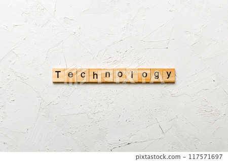 Technology word written on wood block. Technology text on table, concept Technology word written on wood block. Technology text on table, concept 117571697