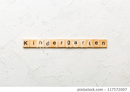 kindergarten word written on wood block. kindergarten text on table, concept kindergarten word written on wood block. kindergarten text on table, concept 117572007
