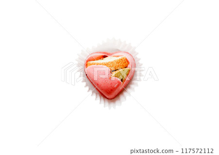 top view of chocolate pralines in heart form isolated on white background 117572112