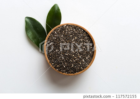Chia seeds in bowl on colored background. Healthy Salvia hispanica in small bowl. Healthy superfood 117572155