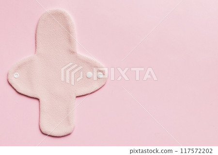 Eco-friendly reusable fabric women's pads. set of colorful bright reusable menstrual pads. zero waste woman periods concept top view with copy space 117572202