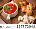 Borsch with pampushkas, chicken drumstick, lard and garlic 117572948