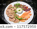 Assorted meats of makhan, chicken balyk and beef tongue with creamy sauce 117572950