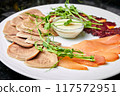 Assorted meats of makhan, chicken balyk and beef tongue with creamy sauce 117572951