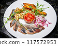 Herring with baked potatoes, pickled mushrooms and sweet onions 117572953