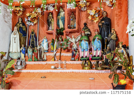 Colorful altar with several Catholic saints Colorful altar with several Catholic saints 117575158