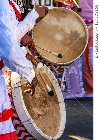 Colorful drummers during a religious celebration Colorful drummers during a religious celebration 117575159