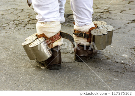Rattle attached to the feet of the rhythmist Rattle attached to the feet of the rhythmist 117575162