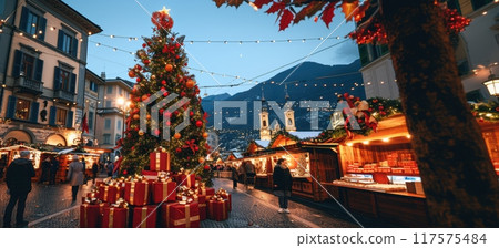 City from angle. Crowdy street with big decorated Christmas tree with large presents under tree with golden bows, Festive mood. City from angle. Crowdy street with big decorated Christmas tree with large presents under tree with golden bows, Festive mood. 117575484