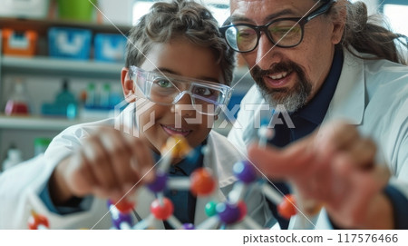 Young student, child guided by knowledgeable mentor, exploring intricate world of chemistry through molecular model. 117576466