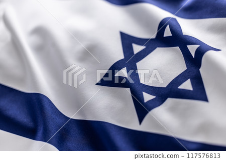 Israeli flag blowing in the wind - Close up Israeli flag blowing in the wind - Close up 117576813