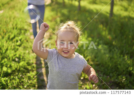 teen sister blowing soap bubbles for toddler teen sister blowing soap bubbles for toddler 117577143