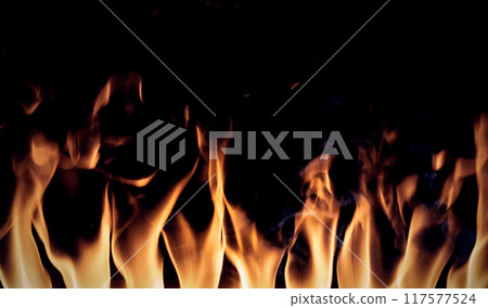 Flames texture background on a black background Flames texture background on a black background 117577524