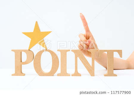 Wooden alphabet blocks arranged with the word "POINT" Wooden alphabet blocks arranged with the word "POINT" 117577900