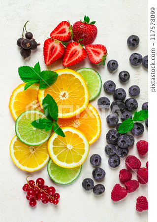 mix of fruits and berries,set, assortment, sliced citrus fruits, raspberries, blueberries, mint leaves, strawberries, red currants, food background, fruit wallpaper, 117578099
