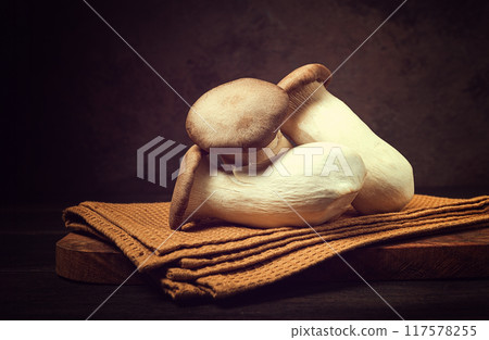 fresh eringi mushrooms, raw, royal oyster mushrooms, three pieces, Asian cuisine, no people 117578255