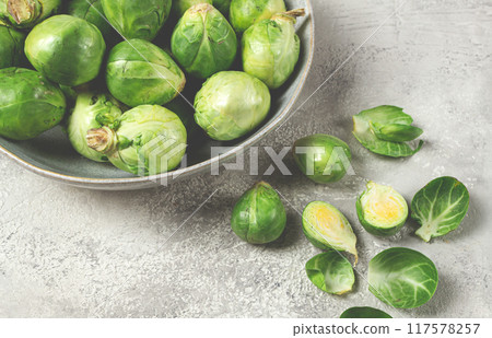 fresh Brussels sprouts, raw, top view, on a gray table, no people, 117578257