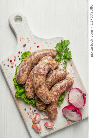 raw kupaty, traditional Georgian sausages, raw sausages, with spices and herbs, Georgian cuisine, 117578396
