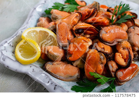 mussels no shell, boiled, mussels, peeled, in a bowl, with lemon and parsley, Chilean mussels, top view, no people, mussels no shell, boiled, mussels, peeled, in a bowl, with lemon and parsley, Chilean mussels, top view, no people, 117578475
