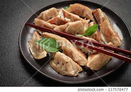japanese fried dumplings, gyoza, sesame seeds, top view, no people, japanese fried dumplings, gyoza, sesame seeds, top view, no people, 117578477