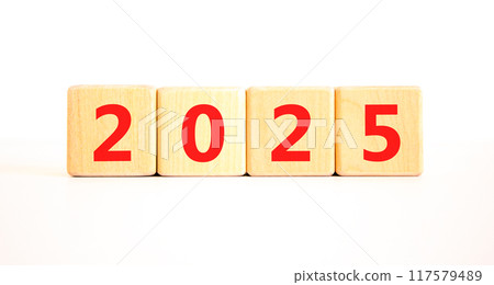 Business concept of 2025 new year symbol. Beautiful wooden cubes with number 2025 Happy new year. Beautiful white table white background, copy space. Business 2025 happy new year concept. Business concept of 2025 new year symbol. Beautiful wooden cubes with number 2025 Happy new year. Beautiful white table white background, copy space. Business 2025 happy new year concept. 117579489