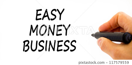 Easy money business symbol. Concept words Easy money business on beautiful white paper. Beautiful white table white background. Businessman hand. Easy money business concept. Copy space. 117579559