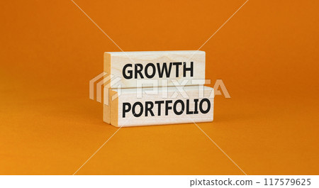 Growth portfolio symbol. Concept words Growth portfolio on beautiful wooden block. Beautiful orange paper background. Business Growth portfolio concept. Copy space. Growth portfolio symbol. Concept words Growth portfolio on beautiful wooden block. Beautiful orange paper background. Business Growth portfolio concept. Copy space. 117579625