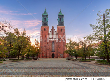 Cathedral of St. Peter and Paul in Poznan at dawn with Gothic towers in soft morning light. 117580028