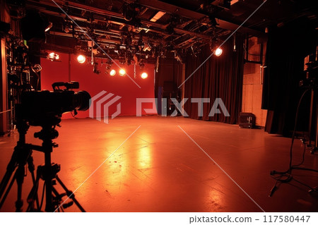 Professional film studio with cameras, lighting equipment 117580447