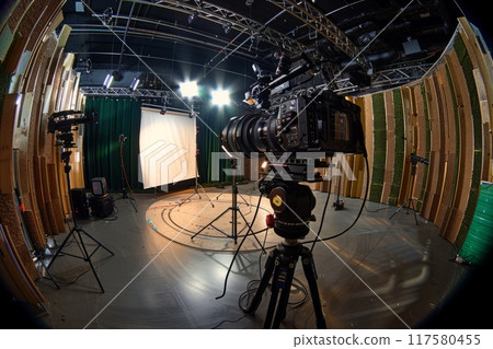 Professional film studio with cameras, lighting equipment Professional film studio with cameras, lighting equipment 117580455