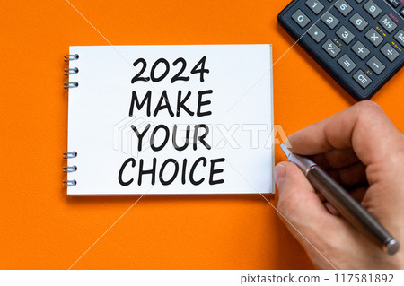 2024 Make your choice symbol. Concept words 2024 Make your choice on beautiful white note. Beautiful orange background. Voter hand. Calculator. Business 2024 Make your choice concept. Copy space 117581892