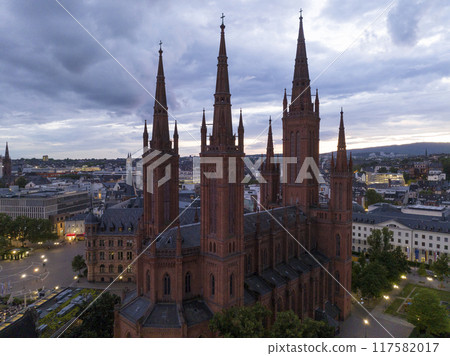 Aerial Drone Shot of Cathedral at Marktkirche in Wiesbaden, Germany. Old town and the city center at Evening Twilight. Aerial Drone Shot of Cathedral at Marktkirche in Wiesbaden, Germany. Old town and the city center at Evening Twilight. 117582017