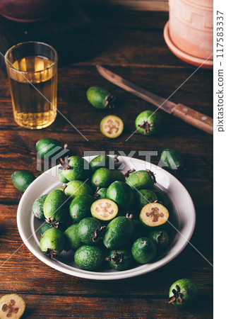 Fresh picked feijoa fruits on a plate Fresh picked feijoa fruits on a plate 117583337