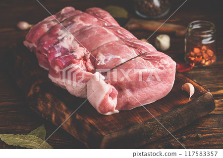 Pork loin joint with spices 117583357