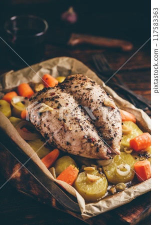 Seasoned chicken breast baked in oven Seasoned chicken breast baked in oven 117583363