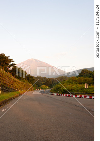 Mount Fuji at sunrise as seen from the Subashiri toll gate on the East Fuji Five Lakes Road in Gotemba, Shizuoka Prefecture 117584624