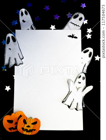 Scary pumpkins and ghosts peeking out of a white banner . Halloween party cards. 117584673