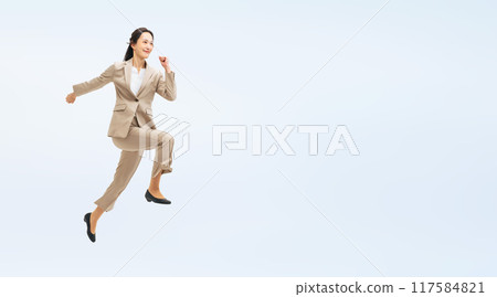 Full body photo of a jumping female business person 117584821