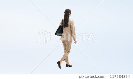 Full-body photo of a walking female business person from behind 117584824