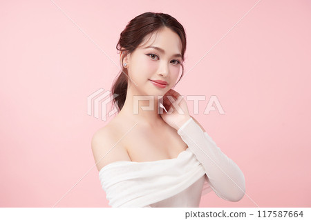 Beautiful young asian woman with clean fresh skin on pink background, Face care, Facial treatment, Cosmetology, beauty and spa, Asian women portrait. 117587664