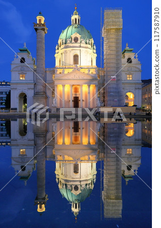 Austria, Central Europe, World Heritage Site, Vienna Historic Center, Illuminated Karlskirche and water mirror night view 117587910