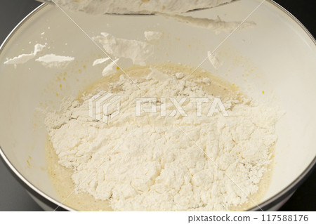 Mix the ingredients to make steamed bread Mix the ingredients to make steamed bread 117588176