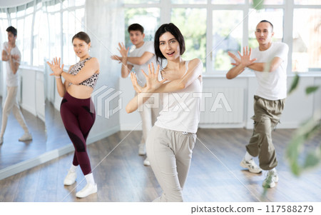 Group of young people dancing jazz funk Group of young people dancing jazz funk 117588279